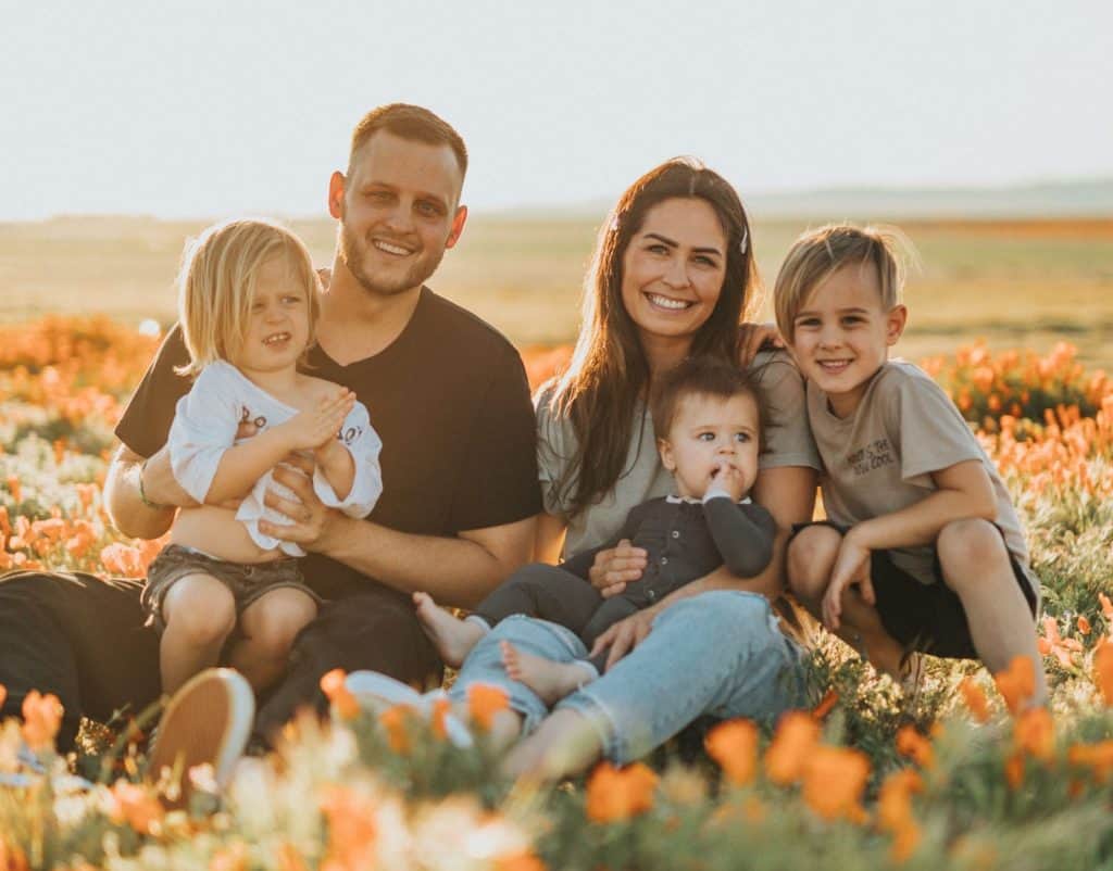 A blended family sitting together.