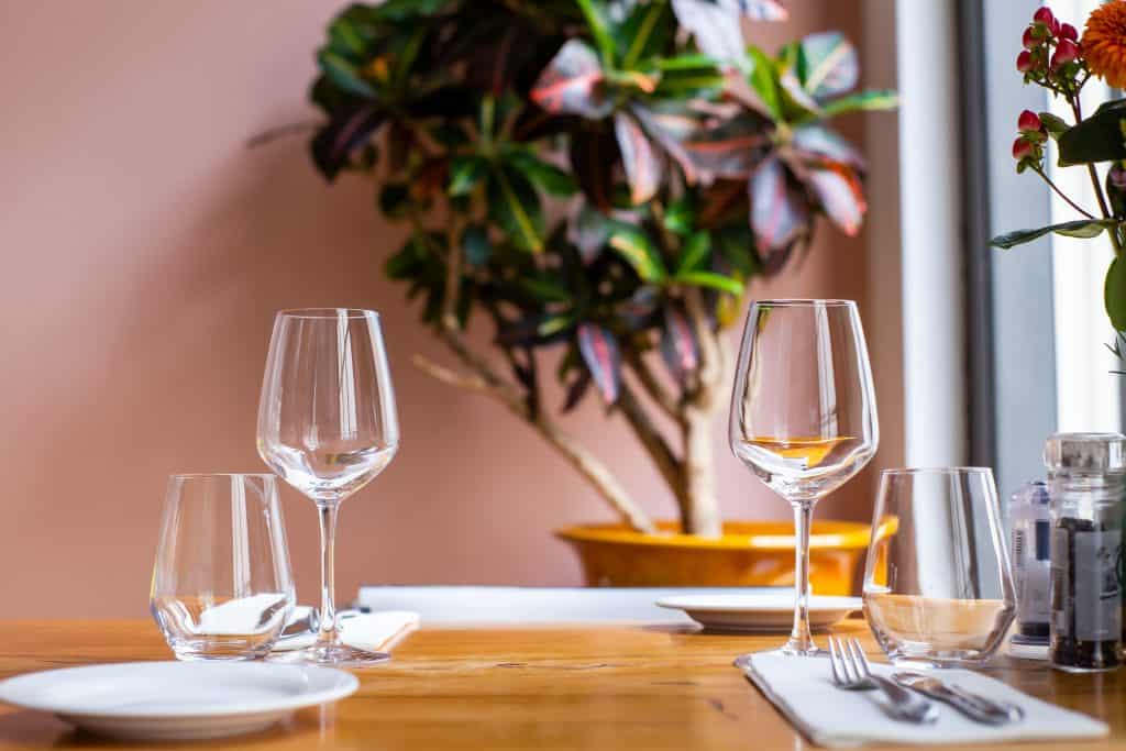 A restaurant table prepared for a date.