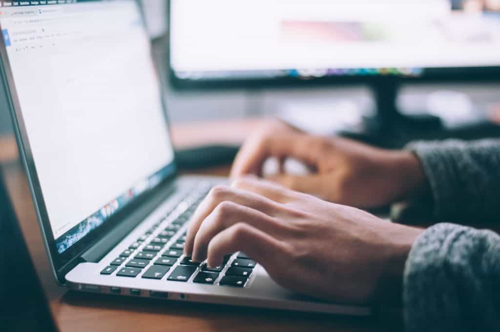 Woman typing an email.