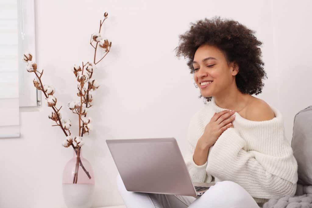 Woman receiving online couples counseling.