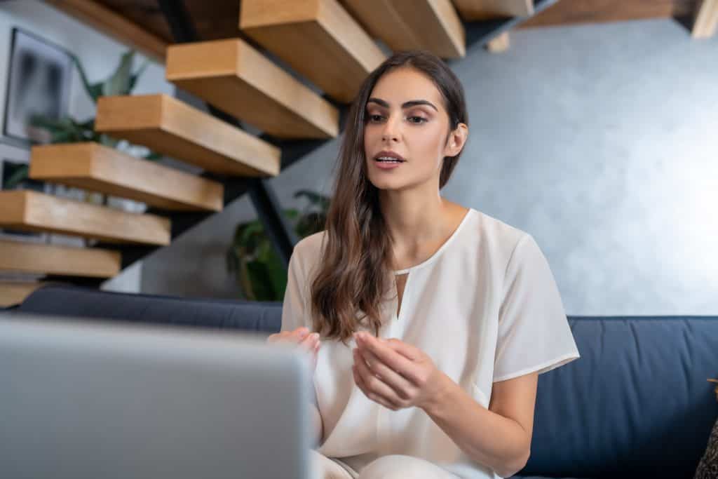 Woman getting online therapy.