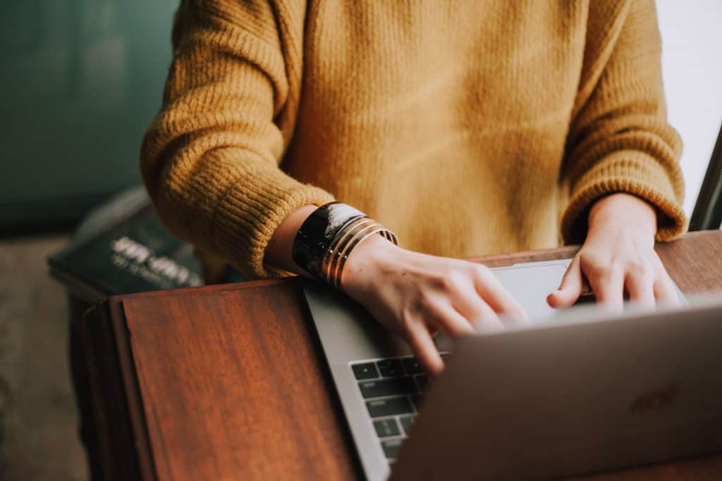 Person getting online therapy on a laptop.