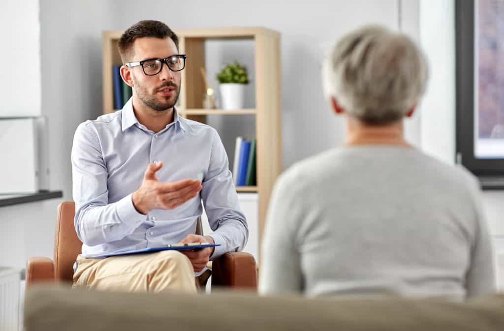 Woman speaking with a gestalt therapist.