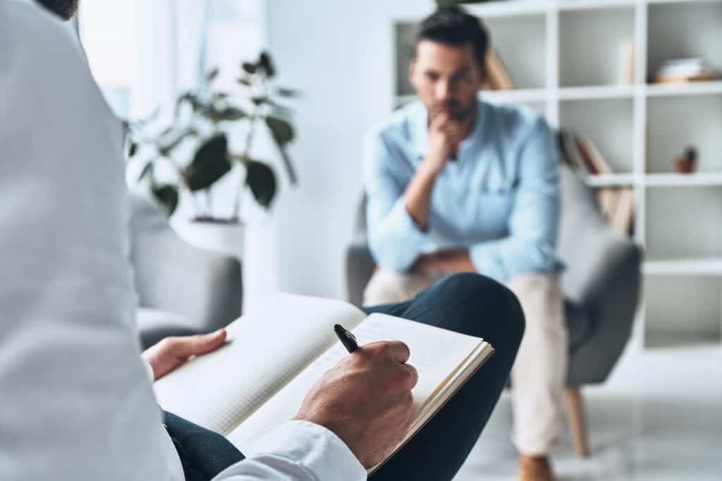 Man speaking with a psychodynamic therapist.